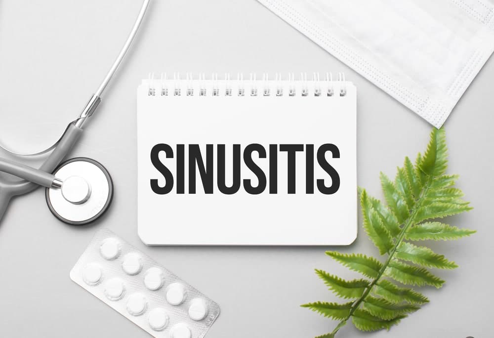 9-11 related Sinusitis Compensation Claims portrayed by stethoscope and notepad that says sinusitis